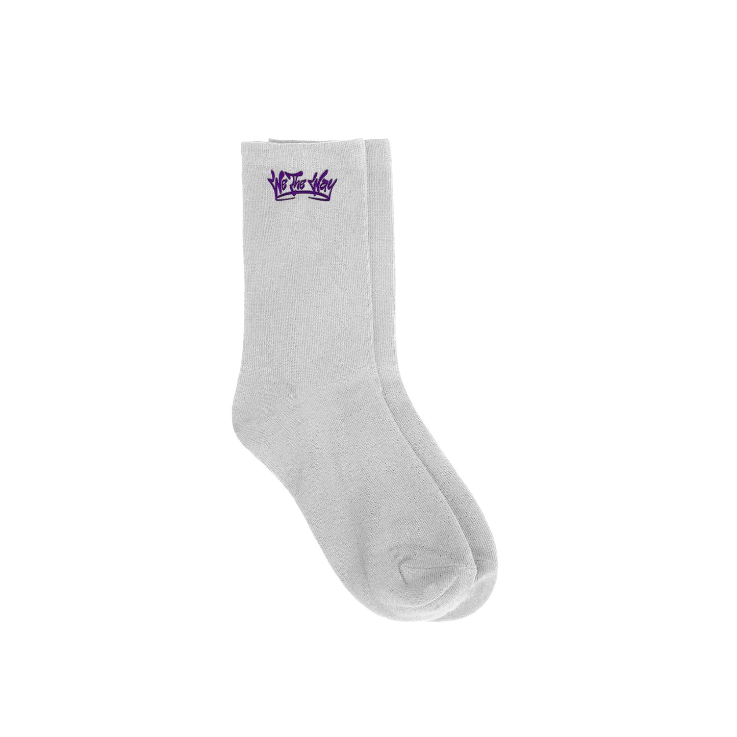 A pair of white socks with a purple We The Way Apparel logo on the ankle area.